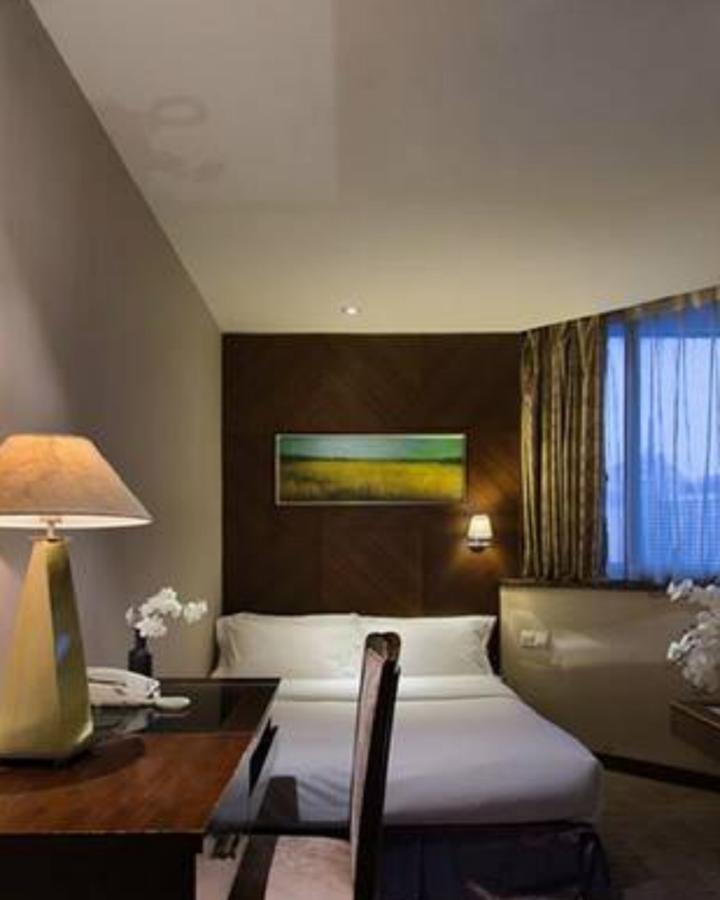 Wanxing Hotel Chao Yang Square Branch Nanning Bagian luar foto